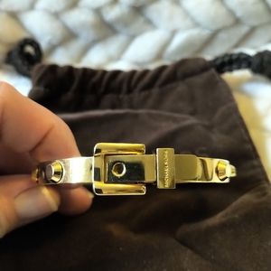 Michael Kors Jewelry - Michael Kors gold belt buckle bracelet. Michael Kors Jewelry - Michael Kors gold belt buckle bracelet.